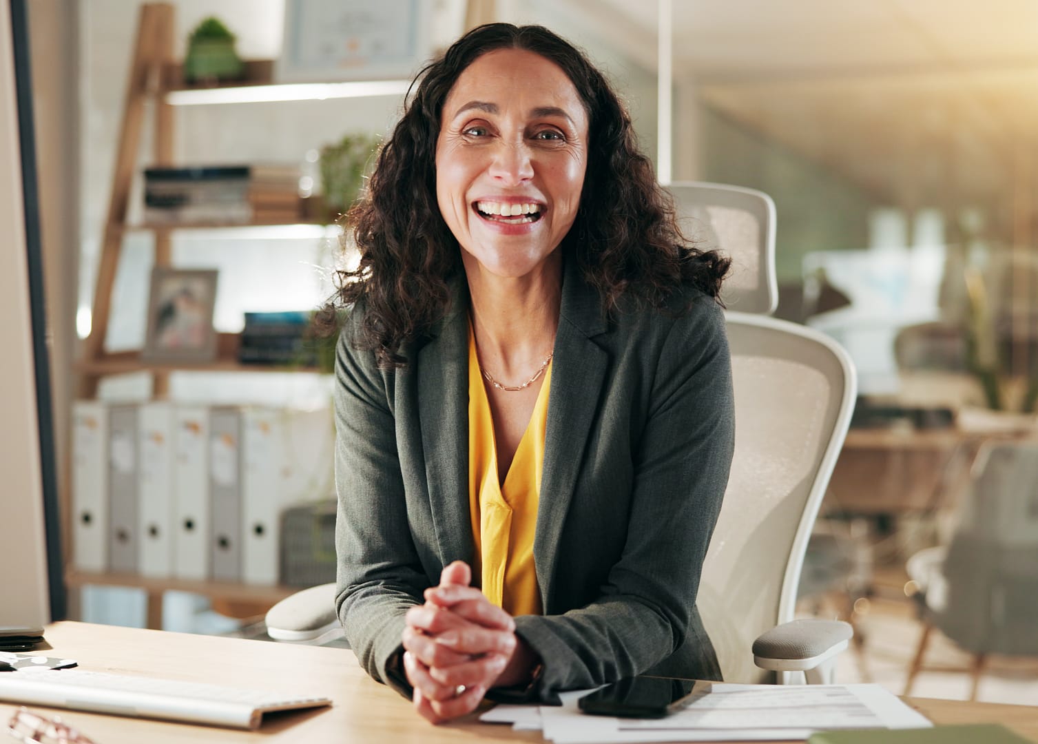 Jill McKeith smiling at her desk